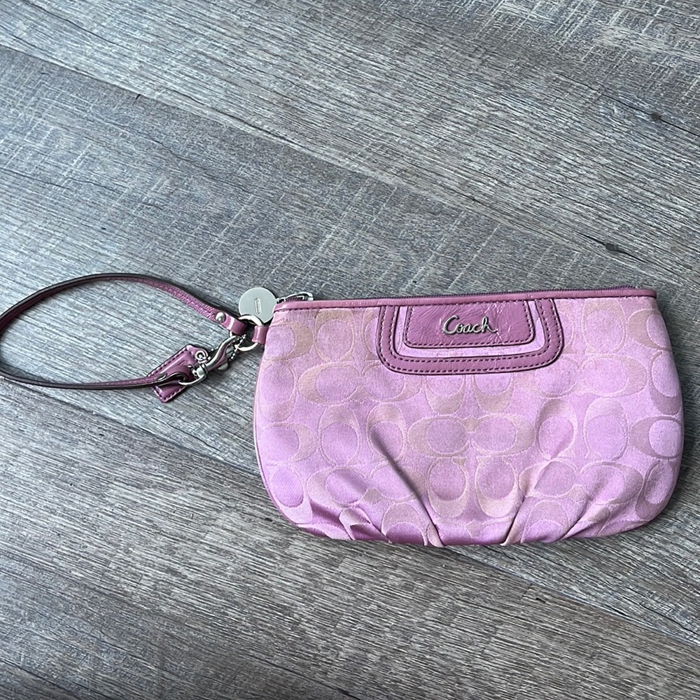 Coach wristlet - used- condition as shown.